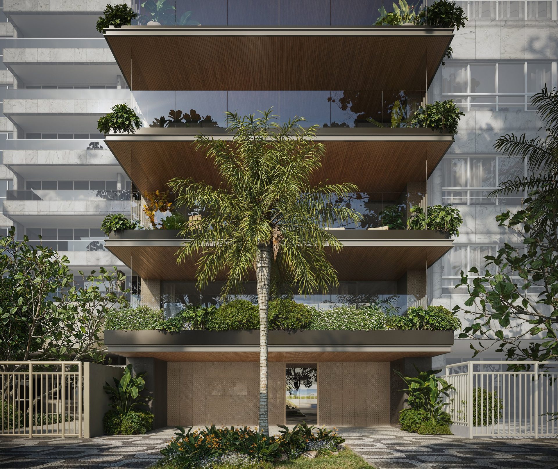 Fachada do VIE — Vieira Souto 432 com acesso principal e jardim tropical em Ipanema